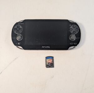 Sony PlayStation PS Vita WiFi (PCH-1001) works great. Needs a charger.